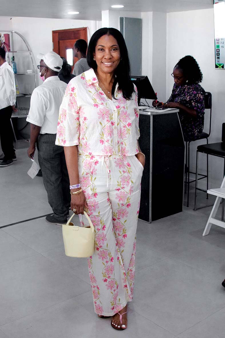 Cheryl Peart brings summer style to the Director’s Lounge in a matching cream two-piece set, with a pink floral print and pale yellow bucket bag. 