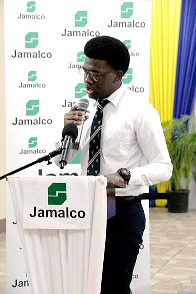 Scholarship recipient Marvin Whyte delivers a testimonial during Jamalco’s Education Assistance Awards Ceremony at the Wembley Centre of Excellence in Hayes, Clarendon, on Wednesday.