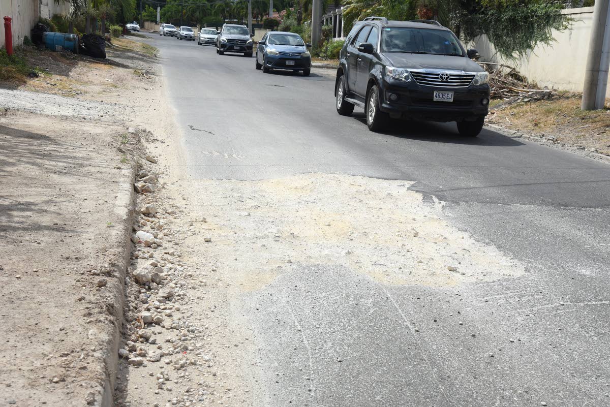 A section of the roadway along Wellington Drive near Mona, St Andrew. 
