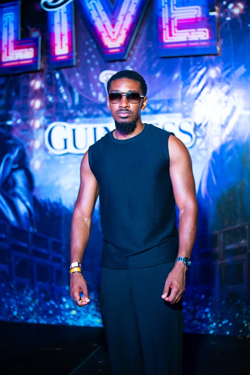 London-based Lenn Tulloch keeps it sleek in a monochromatic look for Dream Live.