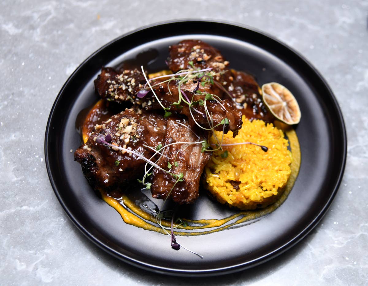 Tamarind lamb chops, served with a Thai curry rice. 