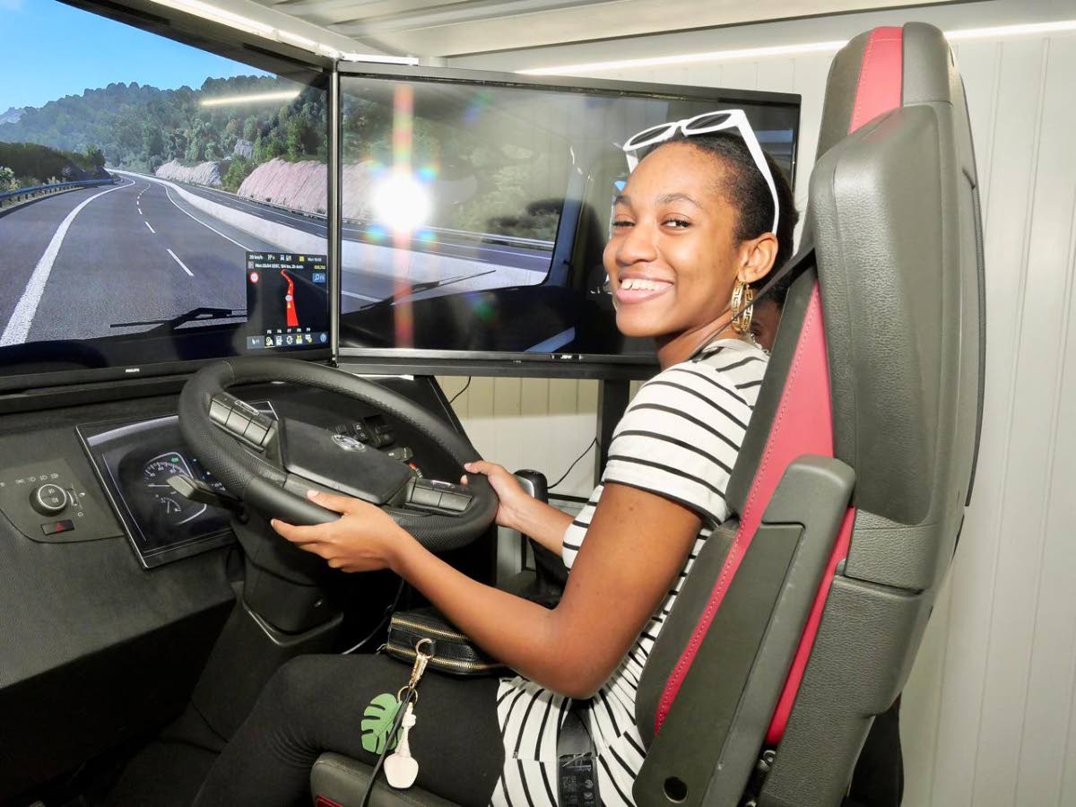 Payge Parkes tests the commercial truck-driving simulator at the Tank-Weld HEART Trucking Academy.