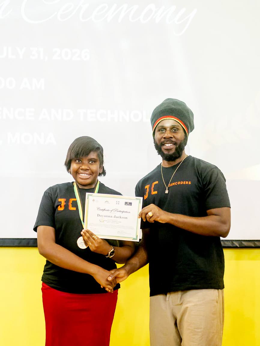 Dayanna Jackson receives her certificate of participation from Chronixx, the reggae artiste, co-founder and conceptualiser of the JamCoders programme.