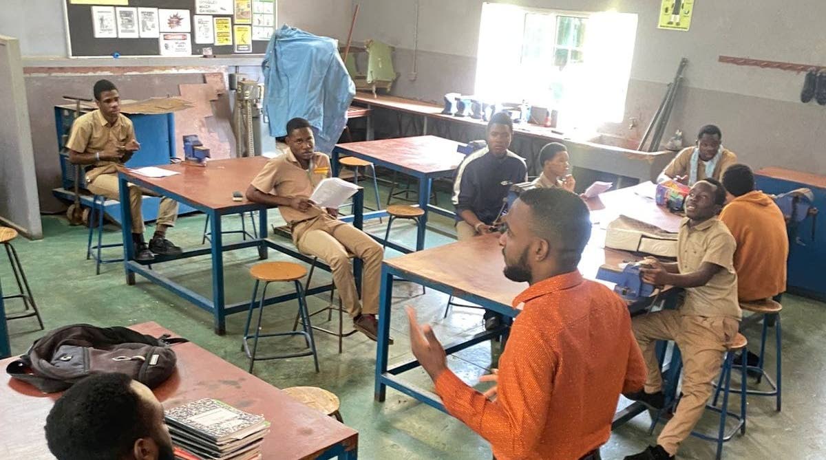 Technical drawing and building technology teacher Kemoy Blake conducting a class at Winston Jones High School in Manchester.