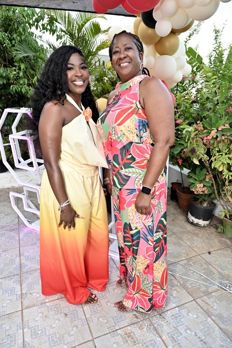 Matching in vibrant hues are Michelle Robinson and her daughter, Makayla.