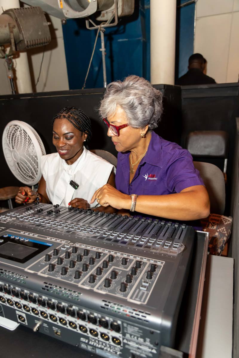 Kim Mair (right), CEO of the JMMB Joan Duncan Foundation, takes a first-hand look at Little Theatre’s new Digital Sound Board System, with her is Marisa Benain, executive director of the Little Theatre. 