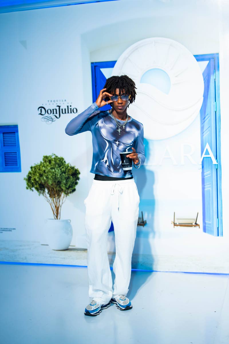 GAG Management model Naeem Foster breaks up the sea of white with a printed top, styled by Gerald Gordon.
