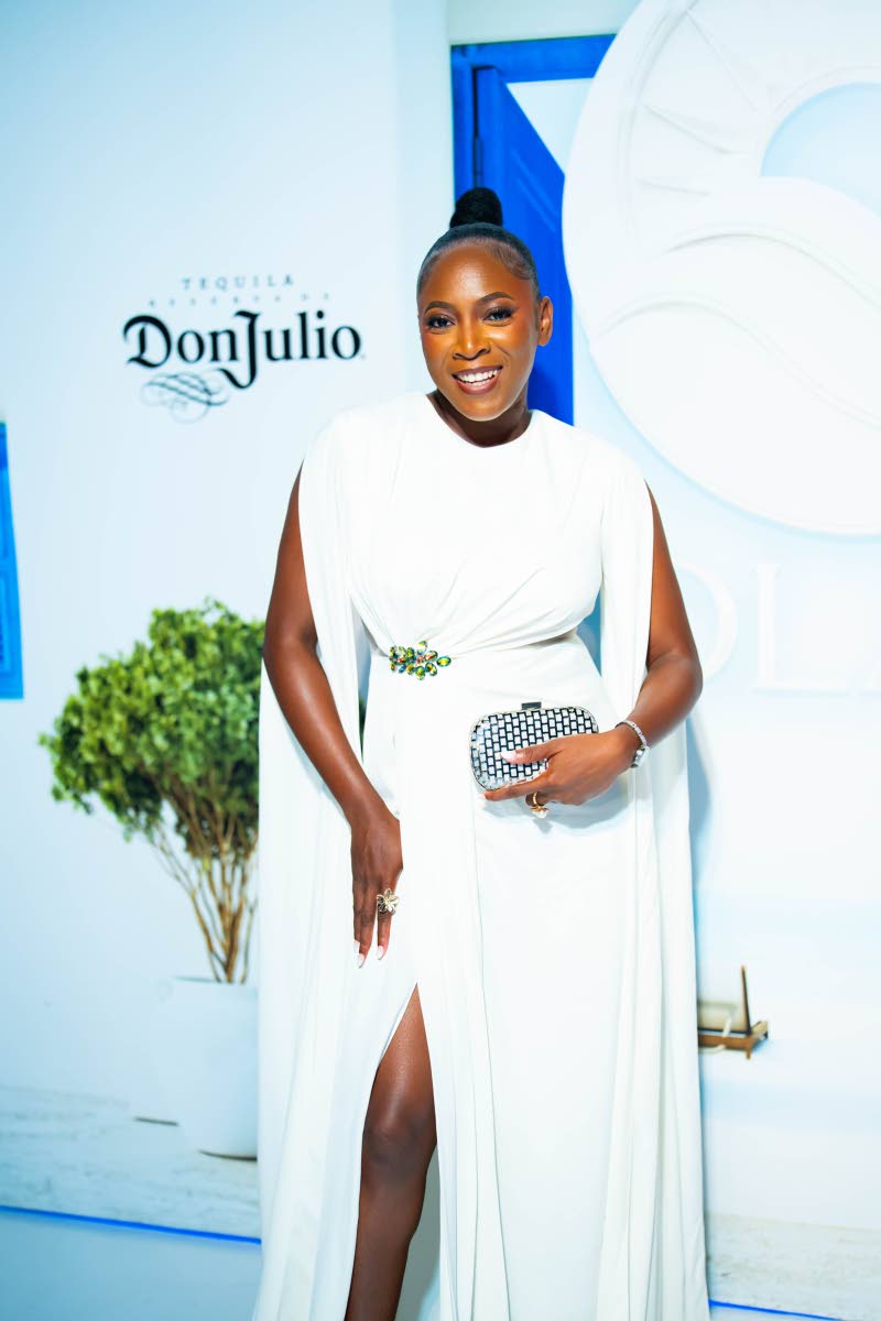 Content creator Monique McLeggon swipes right on a flowing Koko Bella dress.