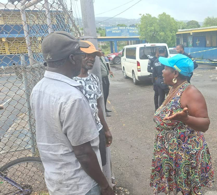 The police responding to an incident at Balcombe Drive Primary and Junior High School in Olympic Gardens, St Andrew, where a section of a building collapsed, killing a man and injuring another on September 1, 2026.