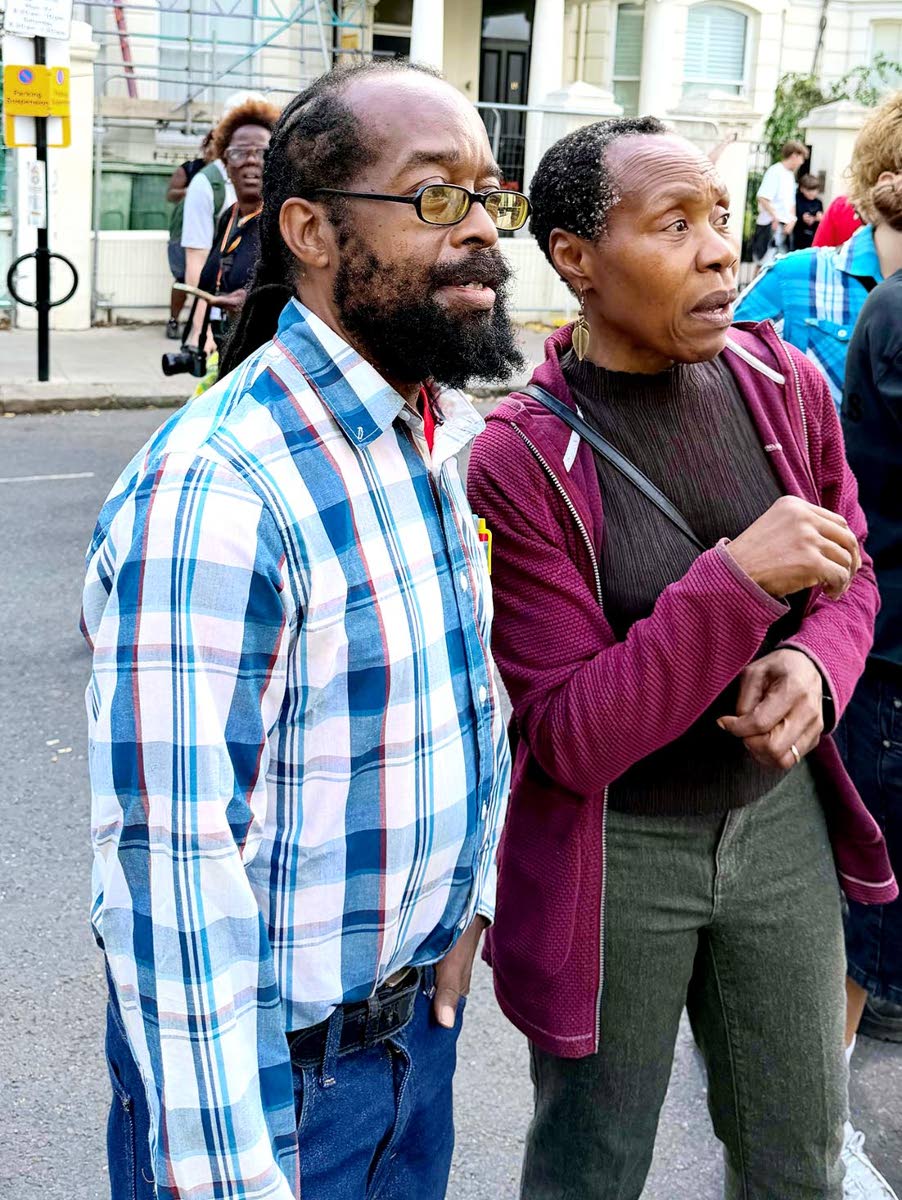 Jamaican cultural specialist Dr Michael Barnett (left) and former Notting Hill Carnival chairperson Dr Claire Holder observe some of the activities at this year’s carnival.