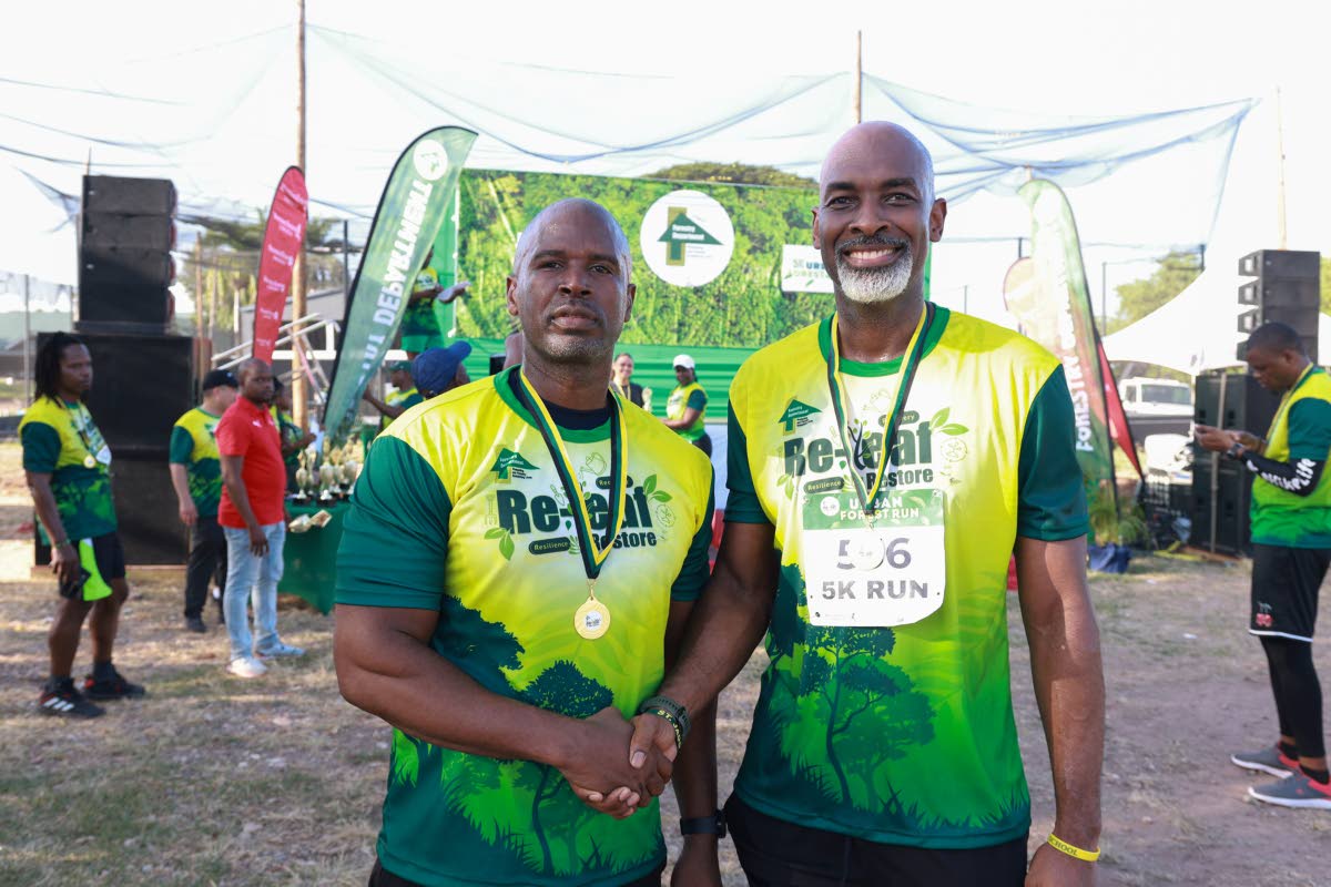 Stokely Rose (left), race patron for the 5K Urban Forest Run 2026, is pictured with Ainsley Henry, CEO and conservator of forests at the Forestry Department. Rose has partnered with the department since 2014, with its outdoor initiatives deepening his appr
