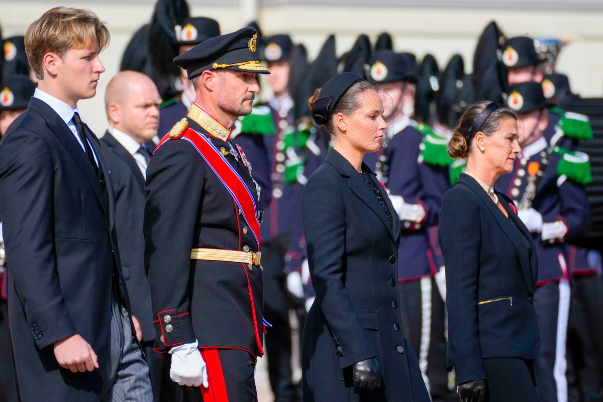 Members of Norway’s royal family (left) Prince Sverre Magnus, King Haakon VIII, Crown Princess Ingrid Alexandra and Princess Märtha Louise walk behind the coffin of King Harald V as it is carried from the Royal Palace to Oslo Cathedral in Oslo, Norway, 