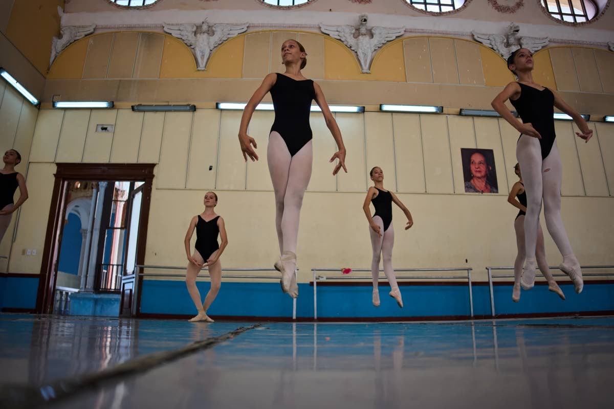 Ballet student Roxana Perez de la Mora, center, attends National Ballet School in Havana, Cuba, September 16. 