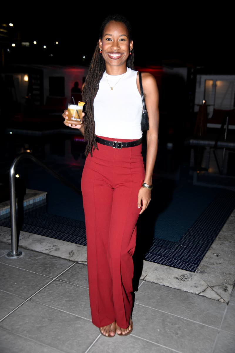 Janne-Marie Ollivierre, social media lead for Rude Boy Drinks, represents in red-and-white style.
