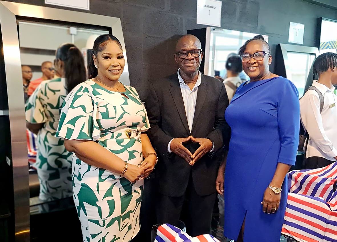 From left: Stacy-Ann Smith, barbering instructor; Professor Paul Ivey, chairman of the school board; and Principal Jacqueline Simpson-Huntley inside the newly opened barber lab at Ewarton High School.