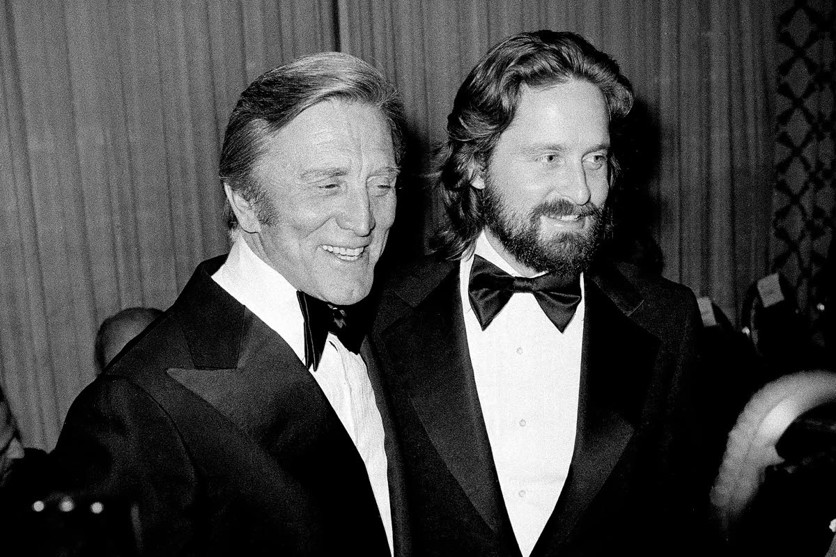 Kirk Douglas (left) appears with his son Michael Douglas at a Friar’s Club dinner in New York, on April 22, 1977.