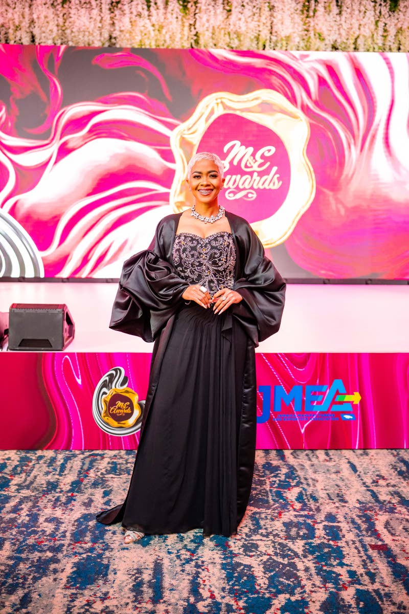 Hostess Debbie Bissoon stuns in an original Lucien Harrison number.