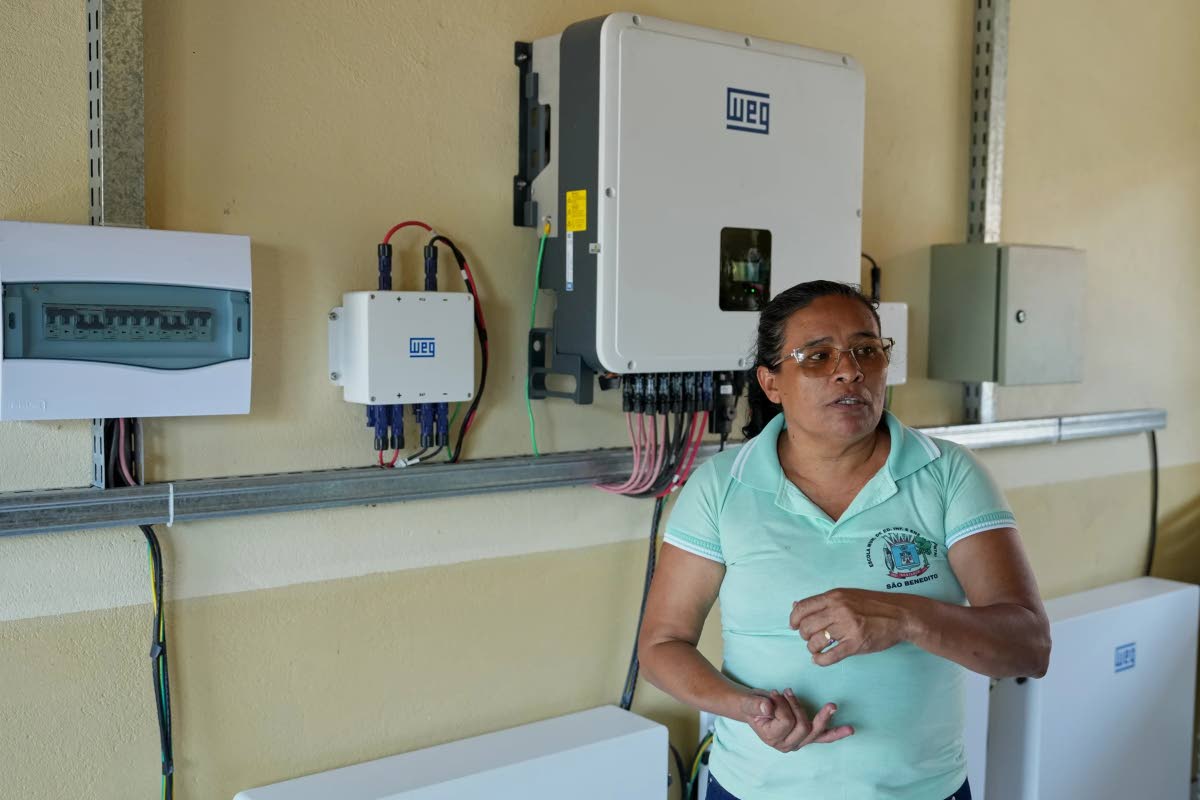 Rosenilce Cruz, the principal of the Sao Benedito School, talks about the solar energy that powers the school, near Santarem, Para state, September 4.