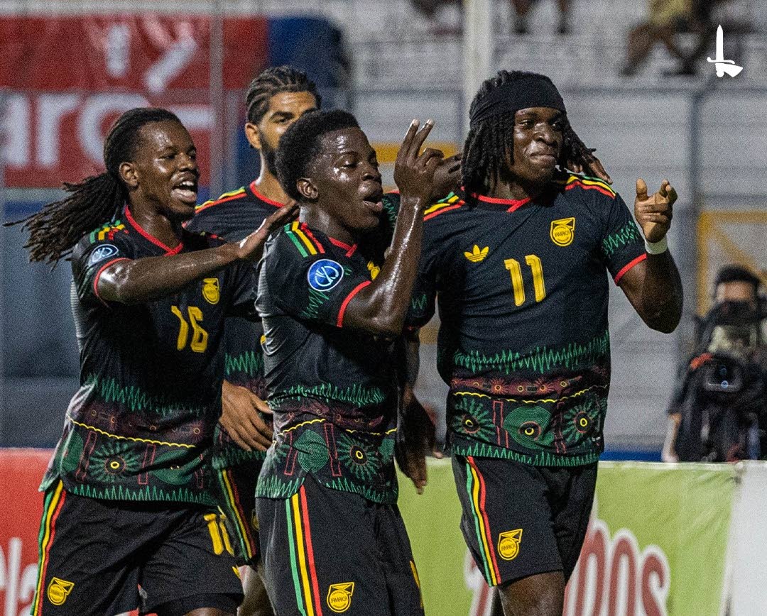 Jamaica’s Tyreece Campbell (right) celebrates scoring against Honduras on Monday.