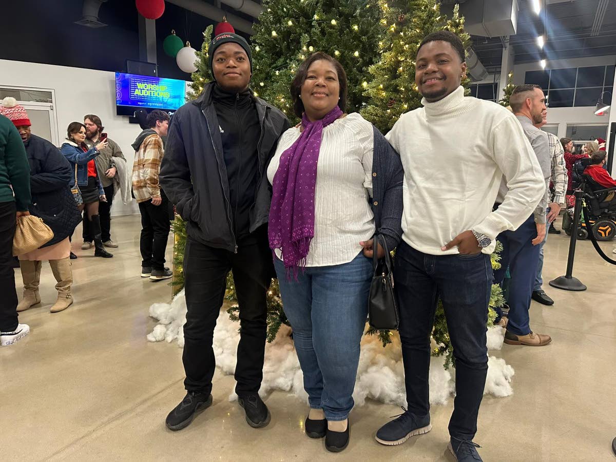On holiday in Atlanta last year, the proud mother was in the midst of her sons Cameron Andrew (left) and Casmere Anthony. 