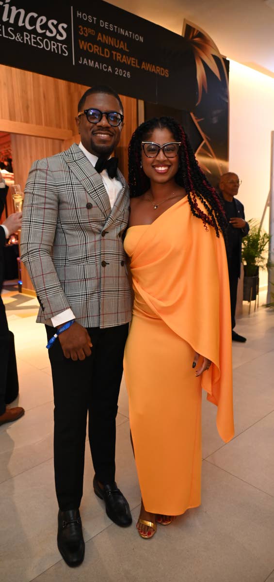 Calvin Lewi of Round Hill Hotel and Villas pairs up with Adrianna Parchment of ICONS Jamaica for a quick snap.