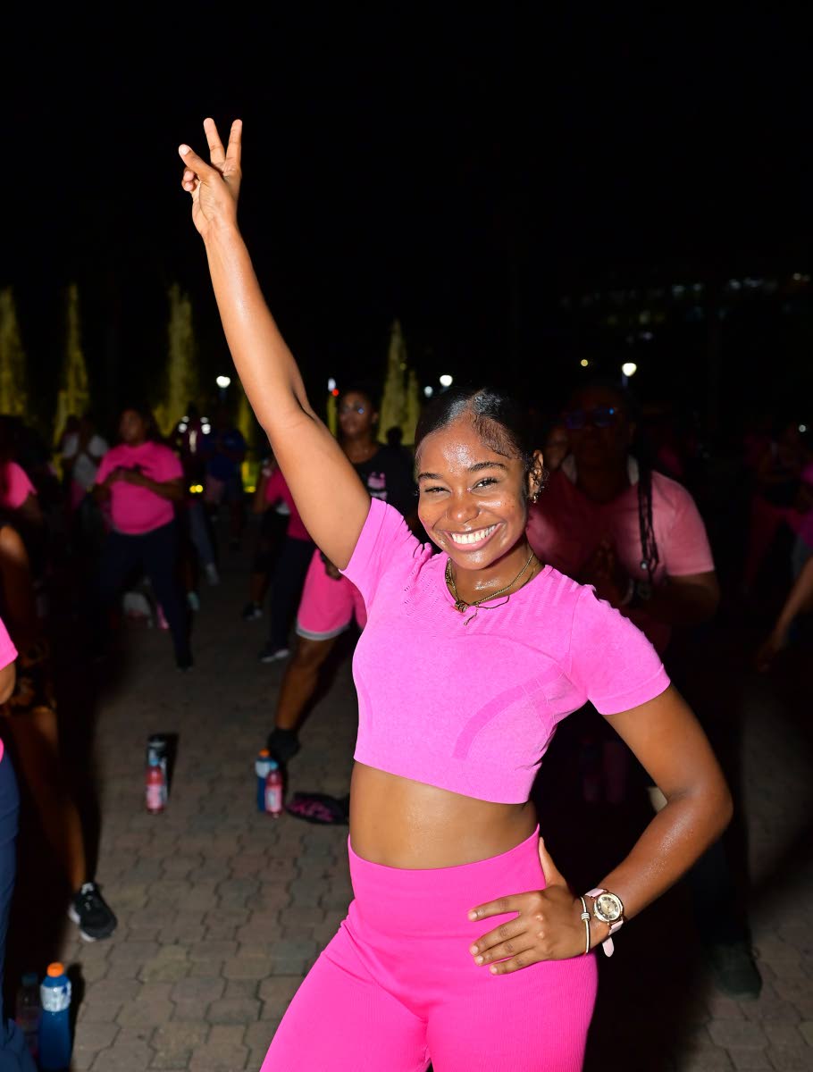 Kayon McLean gives the lens a cute mid-workout pose to mark the occasion.