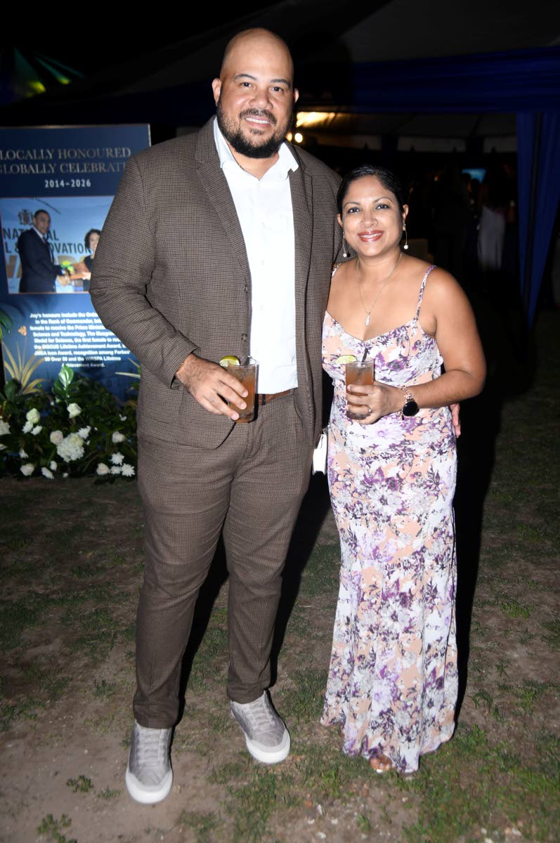 Andrew Bellamy, managing director and chief executive officer of Yard Mas Carnival, arrives with his lifetime plus-one, Corrinne Bellamy.