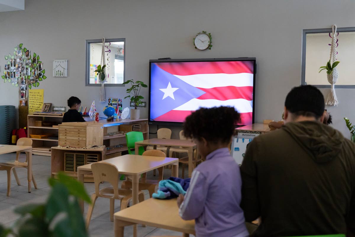 A Puerto Rican flag is displayed on a screen in a classroom at the John Cardinal O’Connor Center for Parent and Child Development, a Head Start centre in San Juan, Puerto Rico.