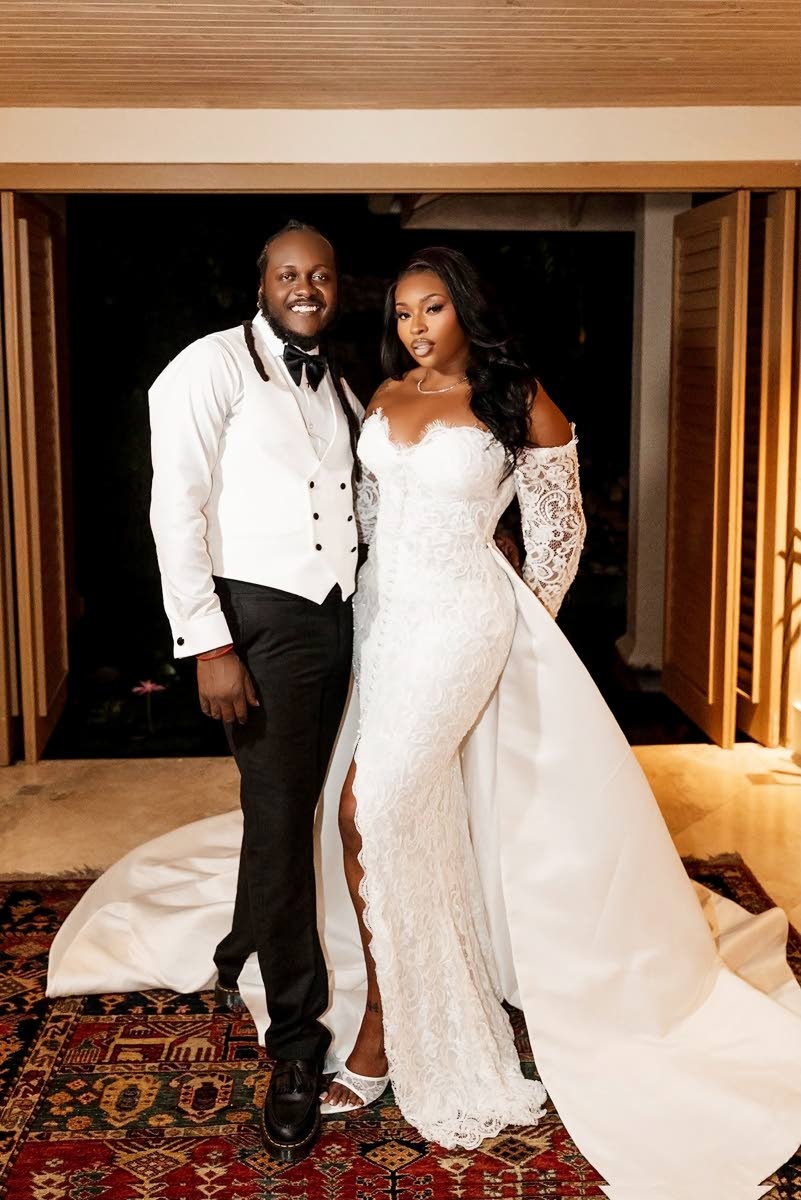 Samory I and Cece pose for the camera on their wedding day. 