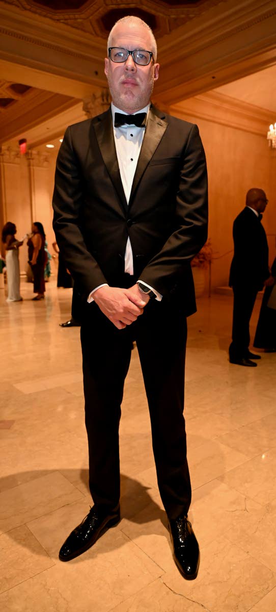 Philip Rose, deputy director of tourism, cuts a dashing figure in a classic black tuxedo.