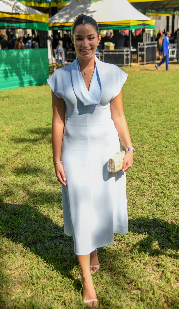 Out to support her father, Transport Minister Daryl Vaz, on his appointment to the Order of Jamaica, Victoria Vaz opts for a subtle shade of blue in an Aritzia find.