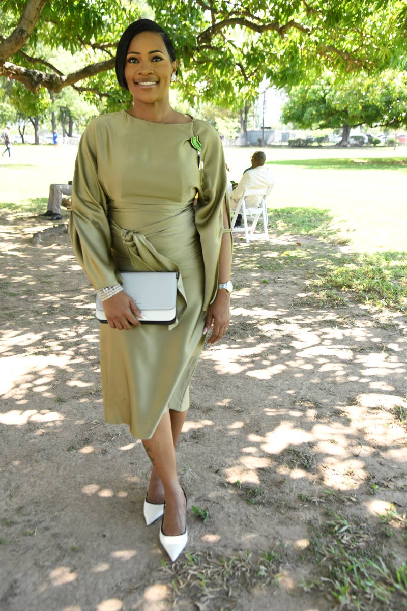 Susan Wilson-Brooks, executive assistant in the Ministry of Local Government and now a member of the Order of Distinction in the rank of Officer, looks chic in a Zara midi wrap dress.