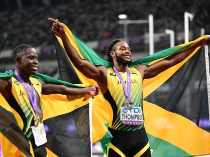 World champion in the men’s 100m Oblique Seville (left) celebrates the win with teamate and silver medallist Kishane Thompson at the World Athletics Championships Tokyo 2025 at the Japan National Stadium, Tokyo, Japan, on Sunday, September 14. 