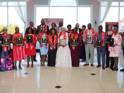  Minister of Education, Skills, Youth and Information, Dr Dana Morris Dixon (centre) with awardees at UJAA’s 35th Anniversary Luncheon and Awards Gala on September 14 at the Greentree Country Club New Rochelle New York.