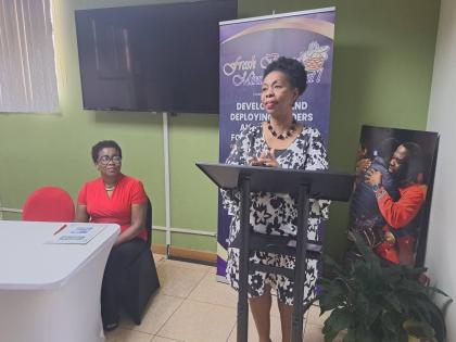 Olga Samuels (at podium), pastor of the Fresh Bread Ministries International [FBMI] nondenominational church in Montego Bay, St James, addresses the media launch of the Bishop Philemon Samuels Scholarship Fund, named in honour of the church’s late founde
