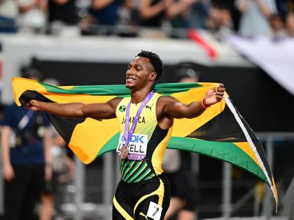 Jamaica’s Bryan Levell celebrates the 200-metre bronze medal he won at the World Athletics Championships inside the Japan National Stadium in Tokyo on Friday. 