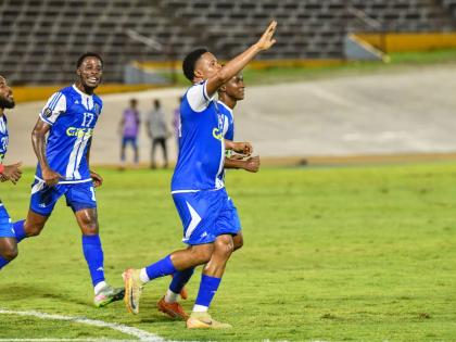 Sue-lae McCalla of Mount Pleasant FA (right) celebrates with his teammates after scoring the first goal of the Concacaf Caribbean Cup match against SV Robinhood at the National Stadium in Kingston on August 19.