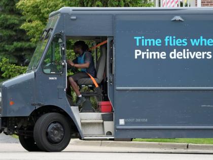 FILE - An Amazon truck makes deliveries in Wheeling, Illinois, May 16, 2024. (AP Photo/Nam Y. Huh, File)