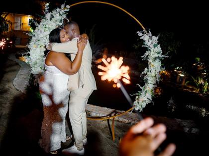 The newly-weds share an official first dance to their favourite song, ‘For You’ by reggae singer, Dennis Brown. 