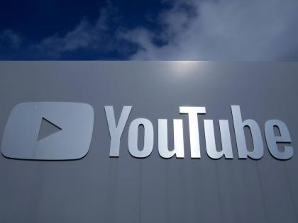 A YouTube sign is shown near the company's headquarters in San Bruno, California, Wednesday, March 12, 2025. (AP Photo/Jeff Chiu, file)