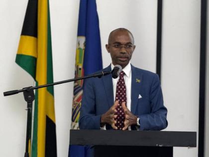 Permanent Secretary in the Office of the Prime Minister (OPM), Ambassador Dr Rocky Meade, delivers the keynote address during the opening ceremony for the Jamaica Cyber Youth Empowerment Academy, held at the S Hotel in Kingston on Monday.