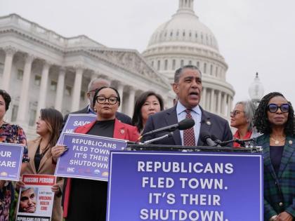 Representative Adriano Espailat speaks during a news conference on the impact of government shutdown on Americans health care on Tuesday at the Capitol in Washington.