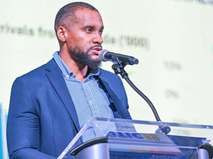 Paul Garnes addressing delegates at SOTIC 2025 in Barbados.