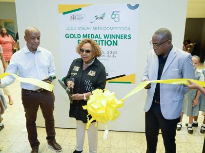 Minister of Culture, Gender, Entertainment and Sport Olivia Grange cuts the ribbon to open the Jamaica Cultural Development Commission’s (JCDC) 2025 Visual Arts Competition Gold Medal Winners Exhibition at the Olympia Art Centre in St Andrew on October 2