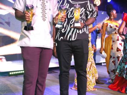 Prince Saj (left), Male Artiste of the Year and winner of Collab of the Year for ‘Nuh More Dan Wi’ with Johnmark Wiggan. 