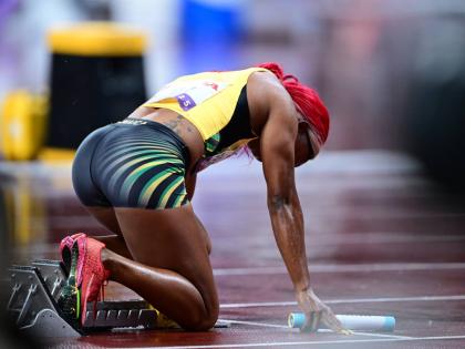 Shelly-Ann Fraser-Pryce gets ready to puh out of the blocks for the very last time during the women's 4x100-metre final at the World Athletics Championships inside the Japan National Stadium.