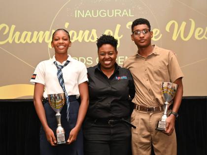 Ashley Anguin, Chairperson, Jill Stewart MoBay City Run Champions of the West committee (centre) is flanked between Shanoya Douglas, Sports Girl of the Year for Track & Field from Holland High School, and Suraj Guwalani, Sports Boy of the Year for Swimming
