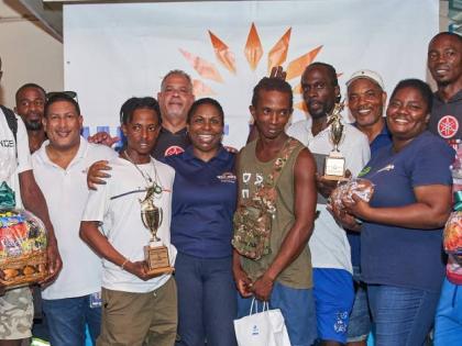  Members of the WIP Team with the first to third  place winners of the 2024 Canoe Tournament.