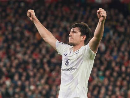 Manchester United’s Harry Maguire celebrates after scoring his side’s second goal during the English Premier League  match between Liverpool and Manchester United in Liverpool, England, yesterday.