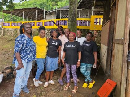Family members (from left) Anita Watson, Naomi Barrett-Davis, Andrene Montague, Macrena Brandford, Marlene Bremmer, Lorna McDonald, Leslie-Ann Brandford and Cynthia Watson gather following a successful staging of the Cedar Valley Community Health Fair in 